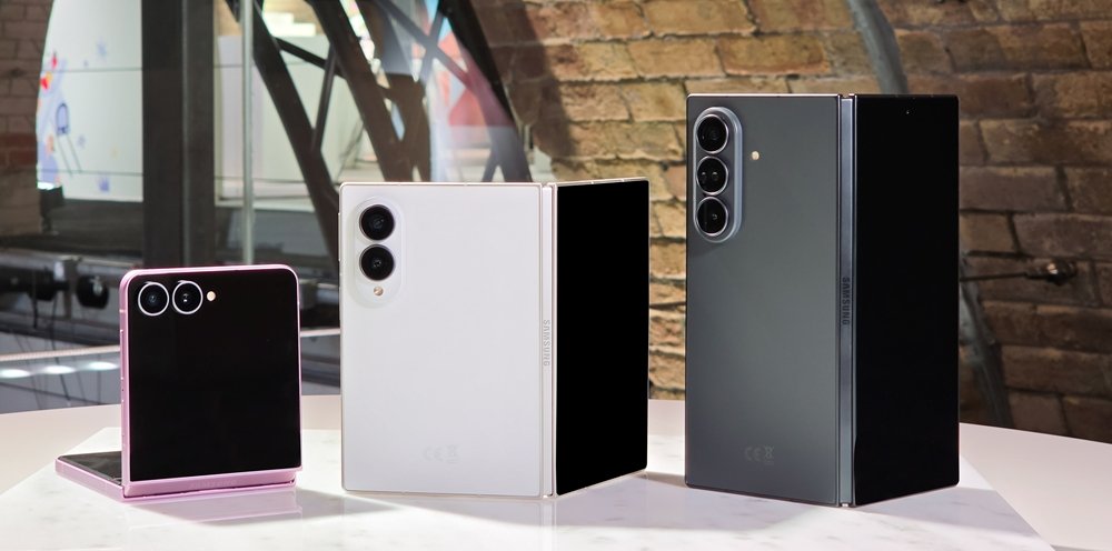 Galaxy Z Flip 8, Galaxy Z Fold 8 and Galaxy Z Fold 8 Ultra standing side by side on a table at the Unpacked event in London